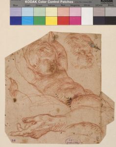 Etude d'un enfant allongé, les bras levés, reprise de sa tête et de sa main gauche, et d'une main (1238.album 15.34)