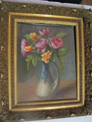 Bouquet de roses dans un vase en grès flammé