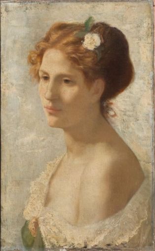 Portrait de femme rousse avec fleur dans les cheveux