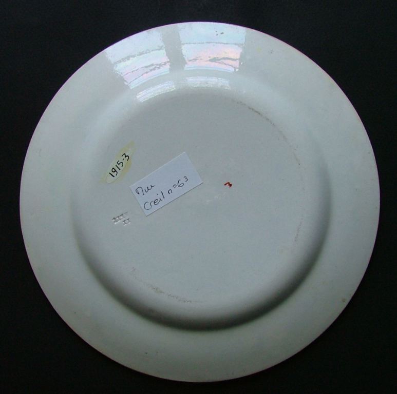 assiette historiée (ronde) ; Les filous à la repousse (titre inscrit)