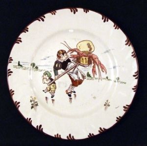 assiette historiée (ronde) ; Cuisinier et enfant affolés par des homards géants sortant d’un pot (titre factice)