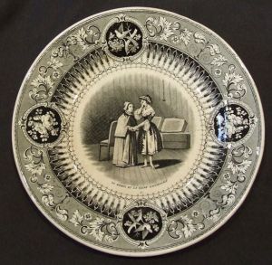assiette historiée (ronde) ; La mayeux et la reine Bacchanale (titre inscrit)